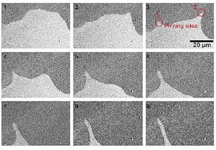 Magnetic domain wall deformation at defect locations