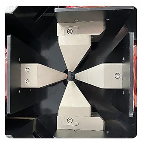 Four-poles vector magnet for in-plane and vertical fields