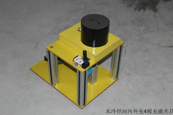 Water-cooled radial internal and external charging magnetizing fixture